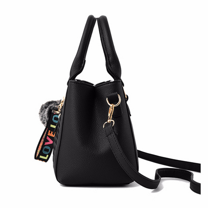 Sac à main city – Bandoulière pratique et pompon tendance