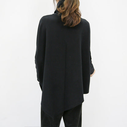 Pull oversize à col roulé asymétrique