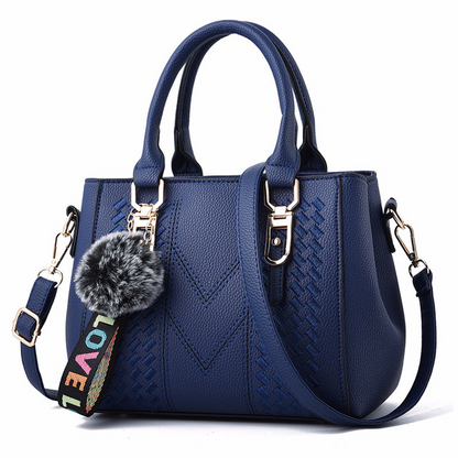 Sac à main city – Bandoulière pratique et pompon tendance
