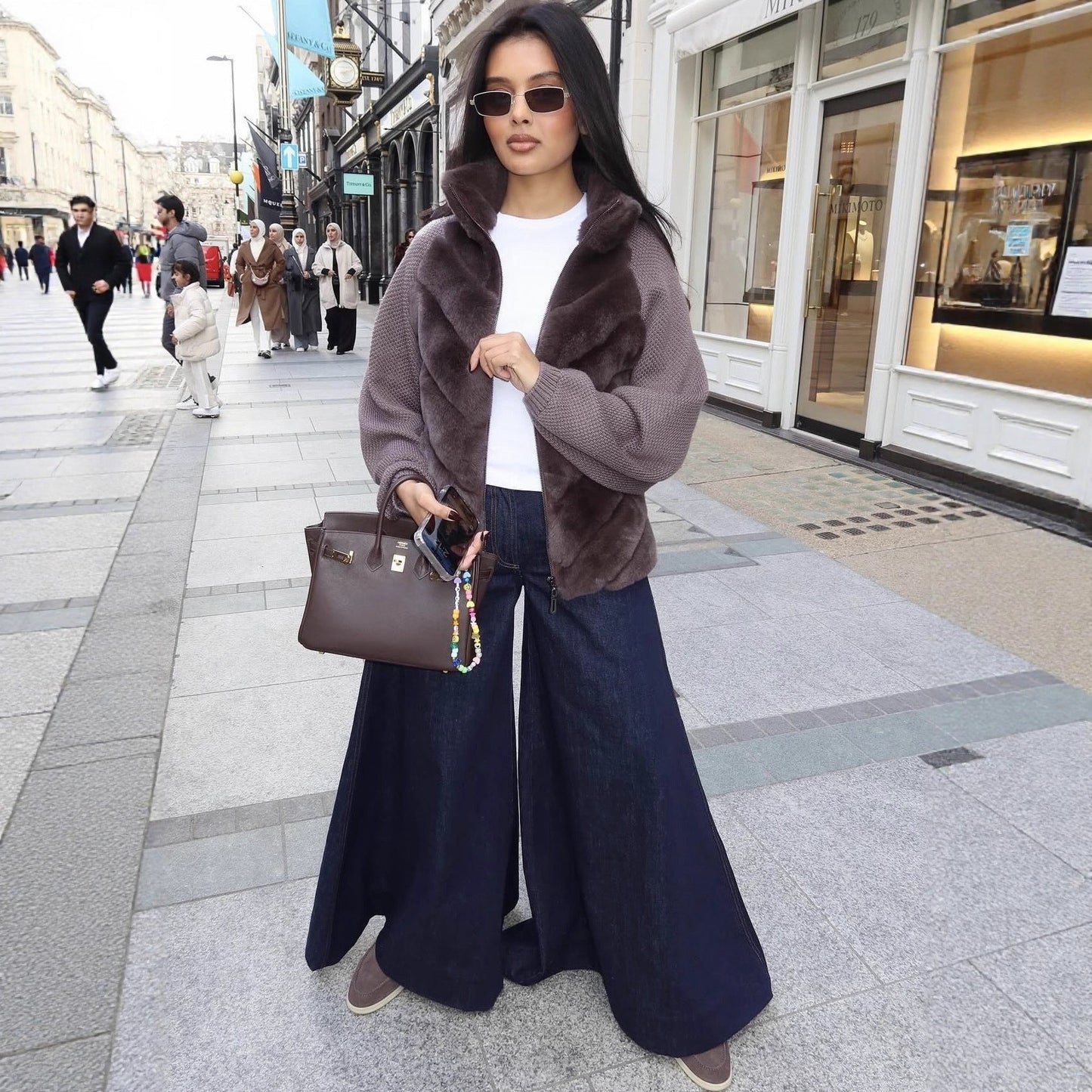 Veste chic bi-matière en fausse fourrure