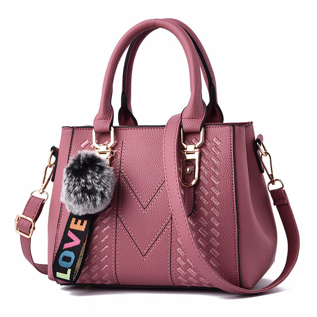 Sac à main city – Bandoulière pratique et pompon tendance