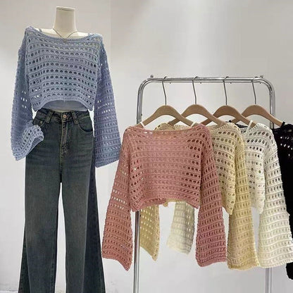 Pull court en maille ajourée tendance