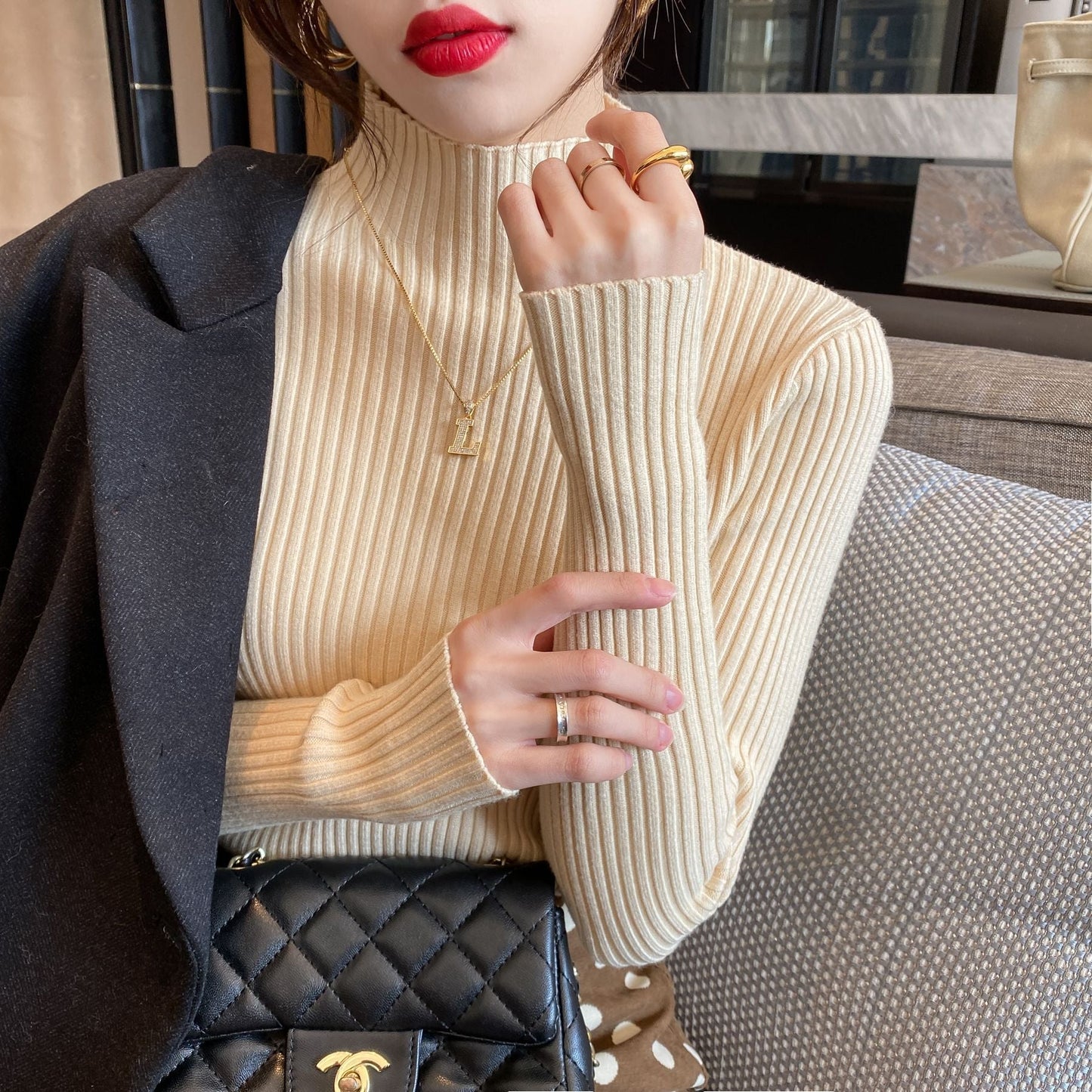 Pull côtelé à col montant – Coupe ajustée et allure chic